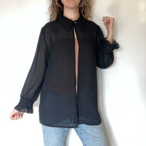 Vintage Joseph Ribkoff Black Sheer blouse with a gold button with ruffled sleeve
